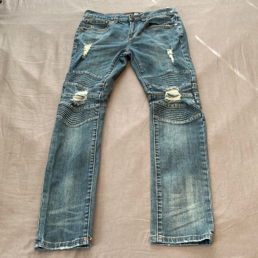 RSQ brand, in London skinny, distressed blue denim jeans, with rubbed detailing